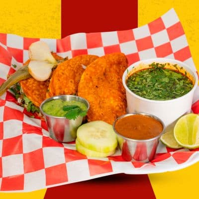 Red Tacos' variety of authentic-flavored tacos: al pastor, asada, chicken, chorizo, carnitas, and sesina, appealingly presented in Indianapolis.