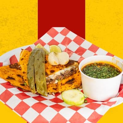 Red Tacos' Taco Tuesday plate with fresh, colorful tacos served in an authentic setting, capturing the essence of Mexican cuisine in Indianapolis.