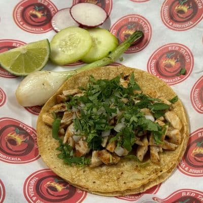 Red Tacos' variety of authentic-flavored tacos: al pastor, asada, chicken, chorizo, carnitas, and sesina, appealingly presented in Indianapolis.