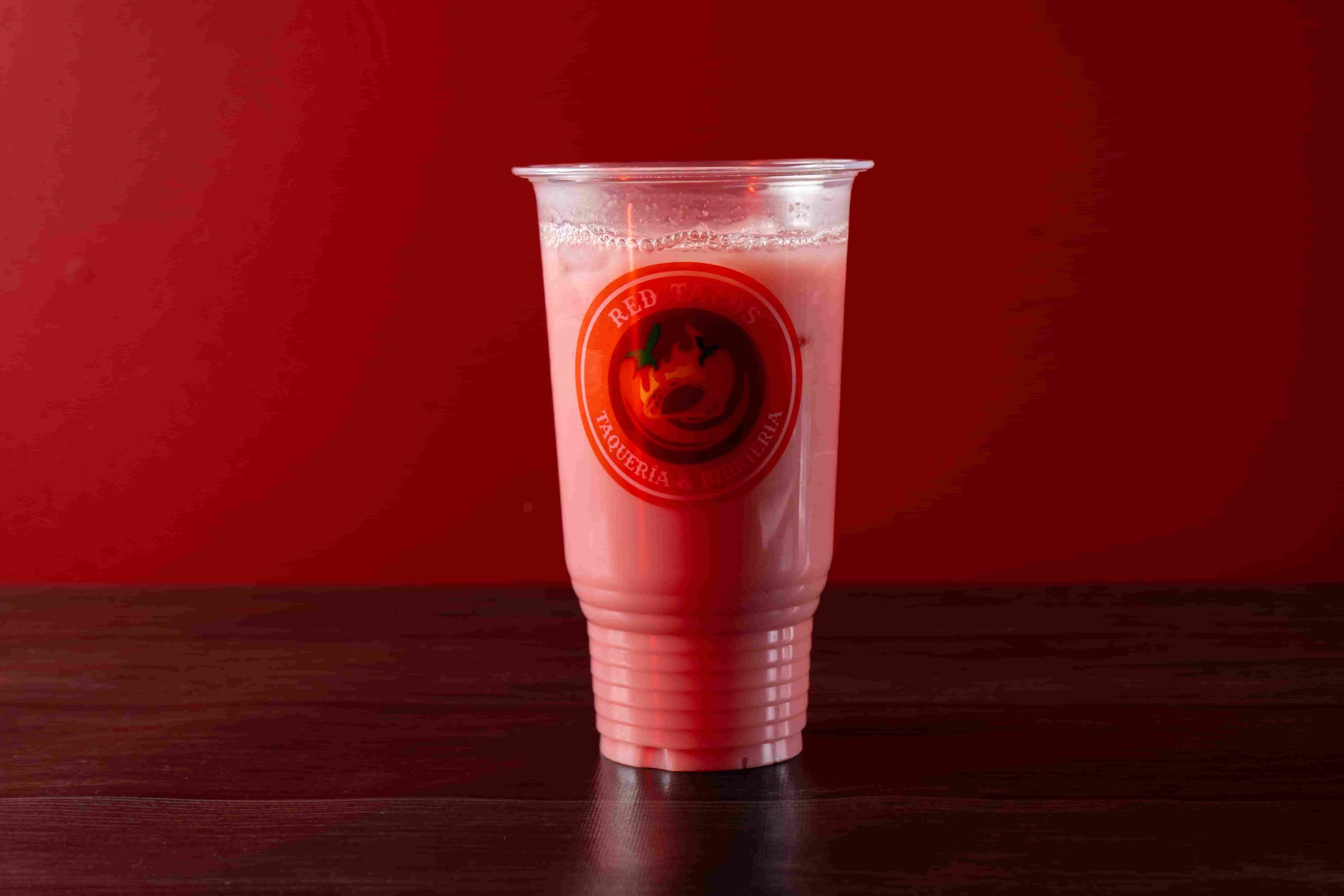 Cold strawberry agua fresca at Red Tacos