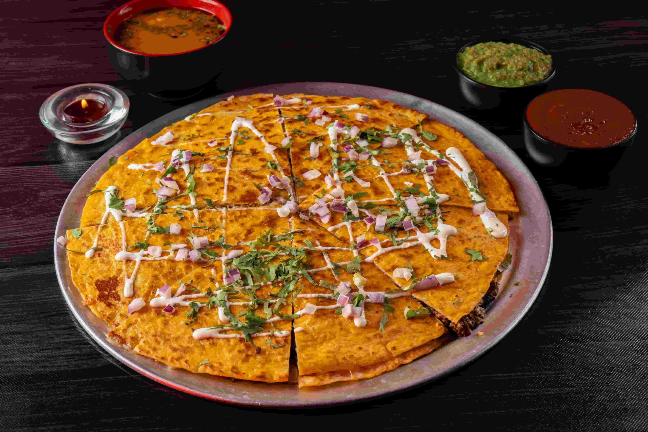 Birria pizza made for sharing