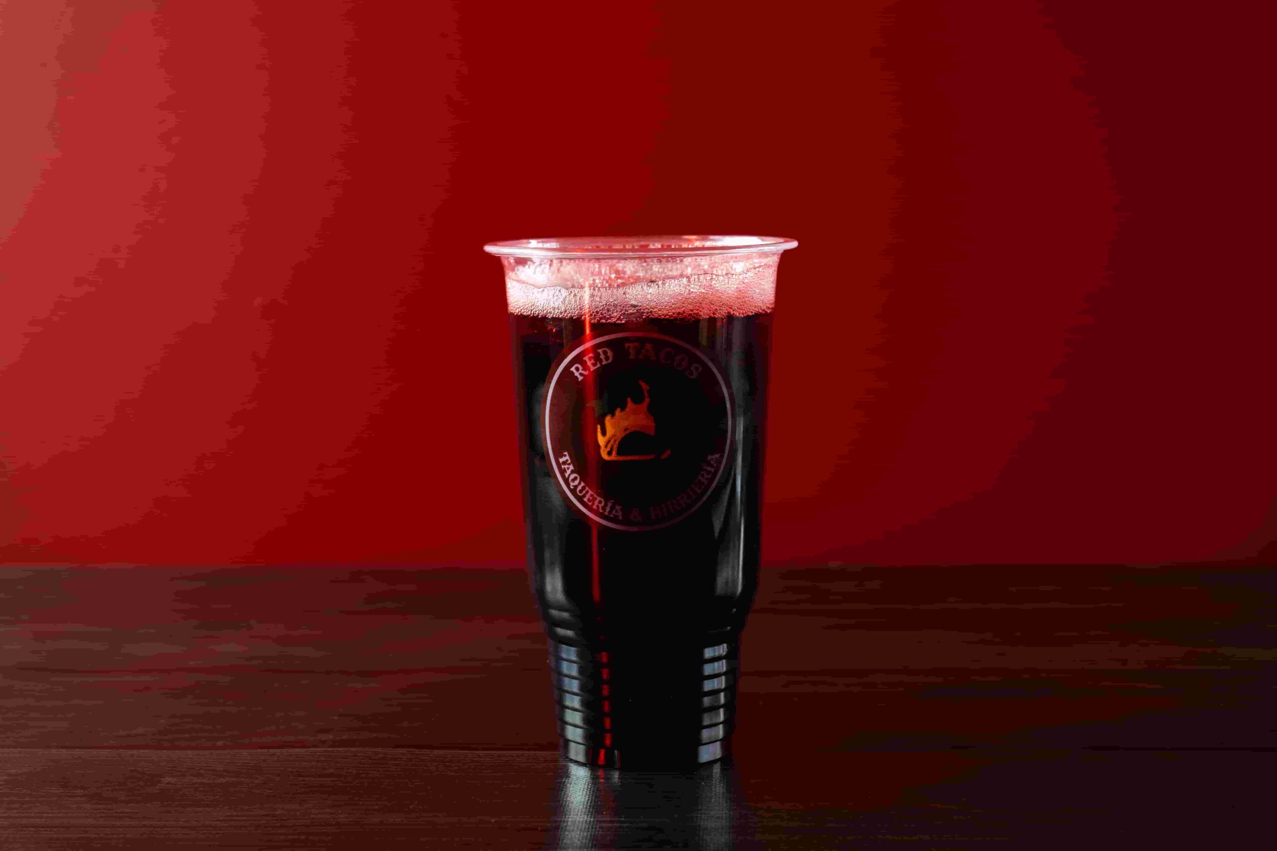 Cold jamaica agua fresca at Red Tacos